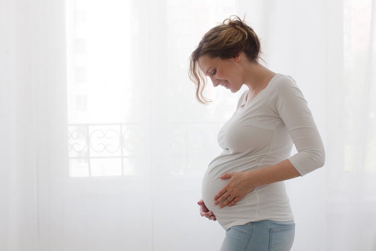 Pregnant woman smiling